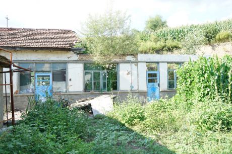 Abandoned house after flooding Xijiang Village