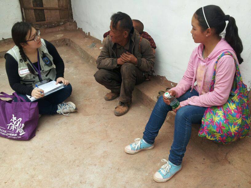 Conducting interviews with a villager with translator